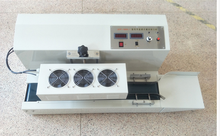 Continuous induction sealer
